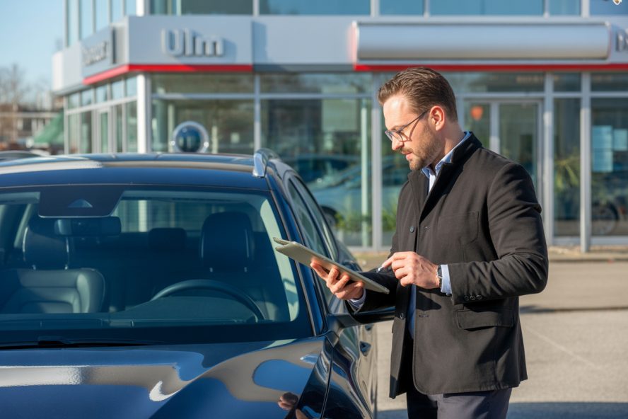 freepik__professional-used-car-dealer-inspecting-a-vehicle-__525-e1772968047902